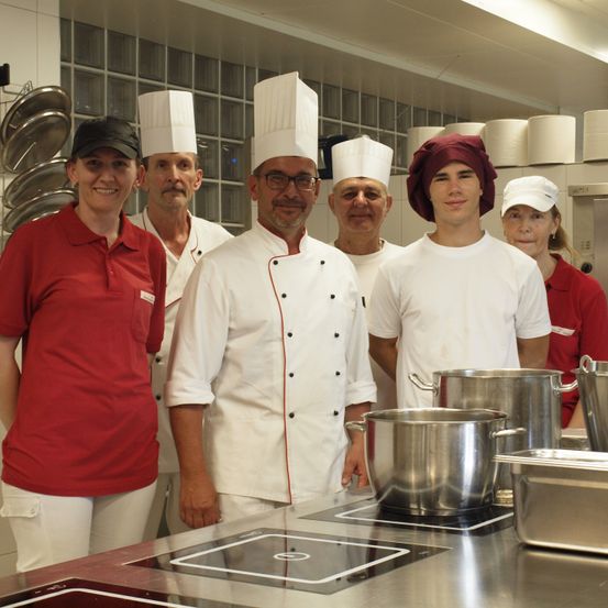 Image contains, Chef, Person, Adult, Female, Woman, Male, Man, Culinary, Face, Kitchen