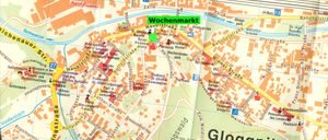 Karte, die den Standort von Wochenmarkt in Glogau zeigt. Die Karte hebt verschiedene Straßen, Wahrzeichen und Sehenswürdigkeiten rund um den Markt hervor.