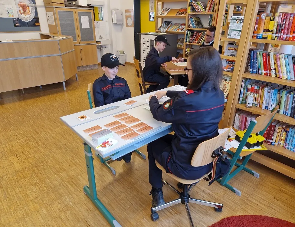 Library, Chair, Plywood, Table, Desk, Shoe, Hat, Adult, Person, Woman
