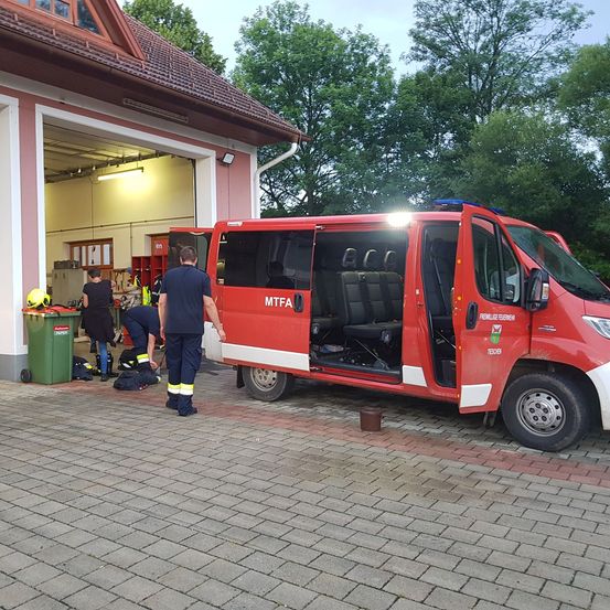 Person, Transportation, Truck, Vehicle, Footwear, Shoe, Moving Van, Face, Fire Station, Fire Truck
