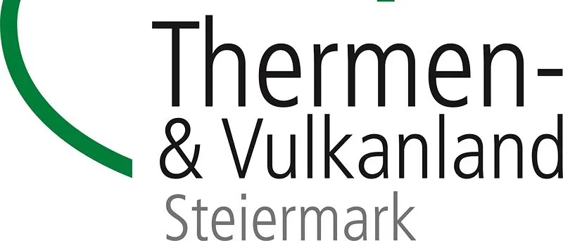 Therms und Vulkanland Steiermark Logo, mit einer grünen Herzform und schwarzem Text.