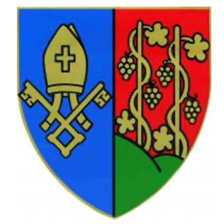 Ein Wappenschild mit blauem und rotem Hintergrund, einem gelben Kreuz auf der linken Seite und einem Weinstock auf der rechten Seite.