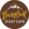 A logo for Berglust Stadt Cafe, featuring a stylized mountain peak with a sun in the background. The text 'Berglust' is in yellow and 'Stadt Cafe' is in white.