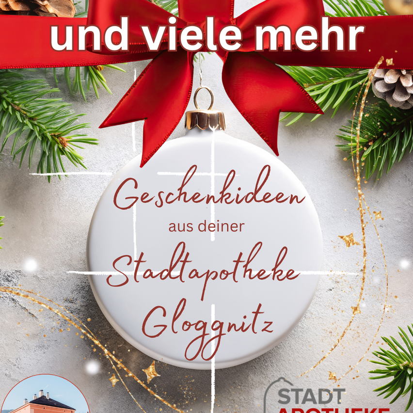 Ein Weihnachtskugel mit einem roten Band zeigt einen Textüberlagerung mit 'Geschenkideen aus deiner Stadtapotheke Gloggnitz'. Der Hintergrund ist grau mit Weihnachtsdekorationen und einem Gebäude.
