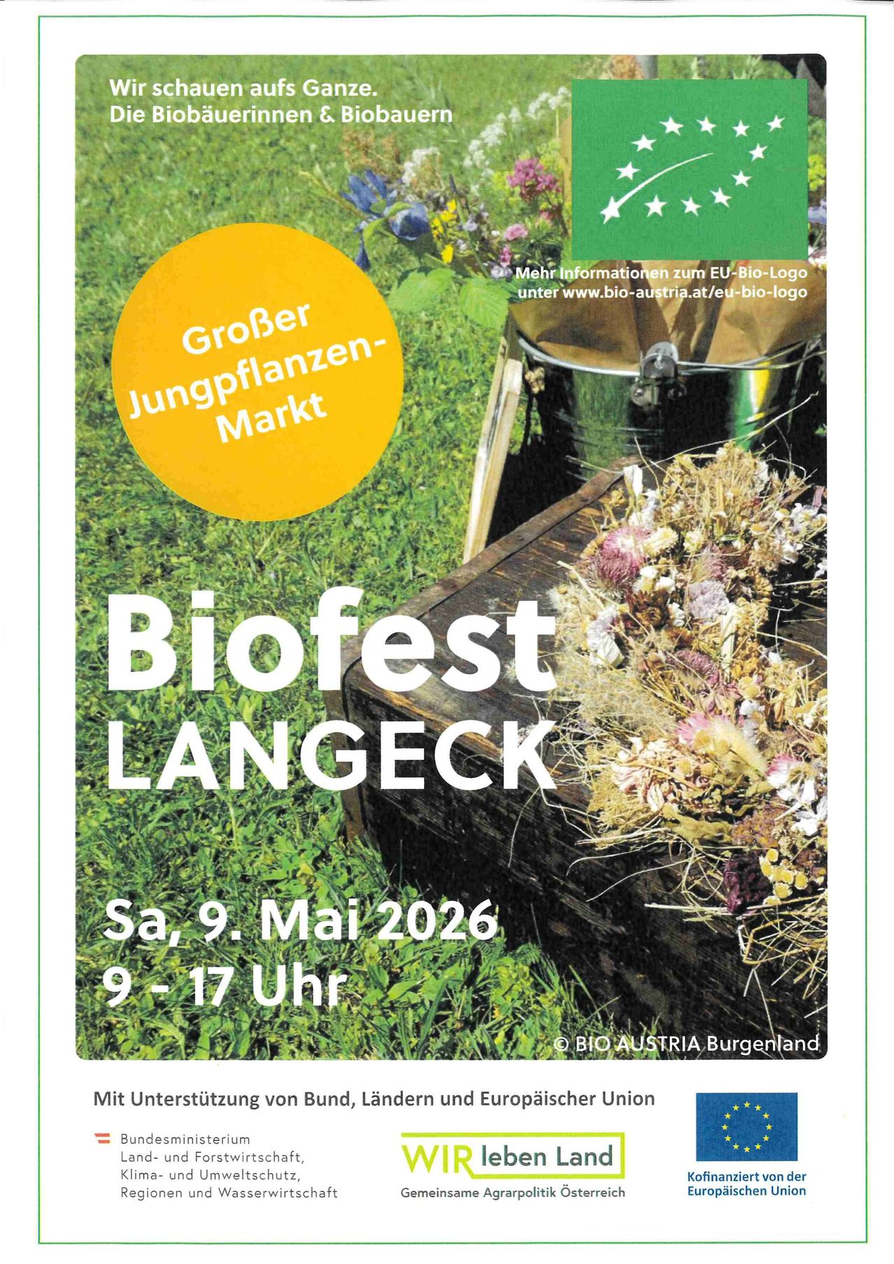 Ein Plakat bewirbt Biofest LANGECK. Es zeigt einen gelben Kreis mit Text und eine grüne EU-Flagge. Der Termin ist Samstag, 9. Mai 2026, von 9 bis 17 Uhr.
