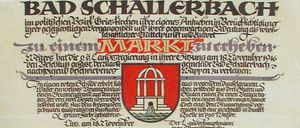 Ein offizielles Dokument aus Bad Schallerbach, datiert auf den 18. November 1946. Es enthält einen roten Siegel mit einem Brunnen und einem Wappen. Der Text ist in schwarzer und roter Schrift.