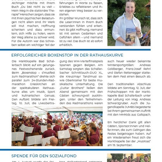 Eine lächelnde Frau hält ein Buch mit dem Titel 'Du bist nicht zu viel' vor einem verschwommenen Hintergrund aus Bäumen.