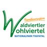 Das Logo für die Aldviertel-Region, mit einem grünen 'W' und den Texten 'Familienregion Aldviertel' und 'NATIONALPARK THAYATAL' in Blau.