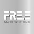 Das Logo von Free Immobilientreuhand, auf einem grauen Hintergrund, zeigt eine moderne, stilisierte Schriftart mit 'FREE' in weißen Buchstaben.