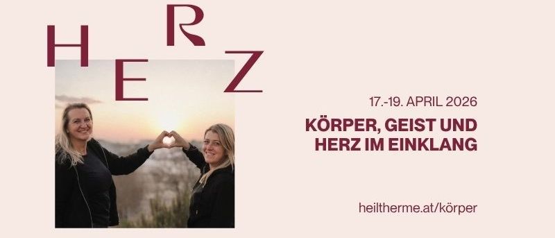 Zwei Frauen lächeln und bilden mit ihren Händen ein Herz. Veranstaltungsdatum: 17.-19. April 2026. Thema: Körper, Geist und Herz im Einklang. Webseite: heiltherme.at/koerper.