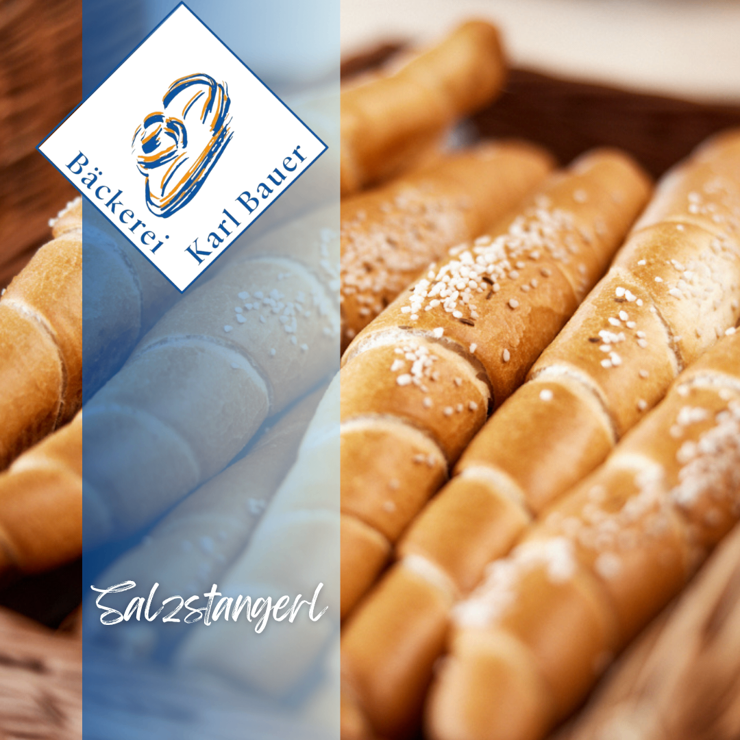 Ein Nahaufnahme eines Korbes voller Brezen mit dem Bäckerei Karl Bauer Logo auf der linken Seite.