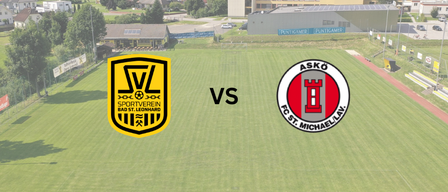 An aerial view of a soccer field with VS and ASKO FC St. Michael/Lav logos. There are houses and trees in the area.