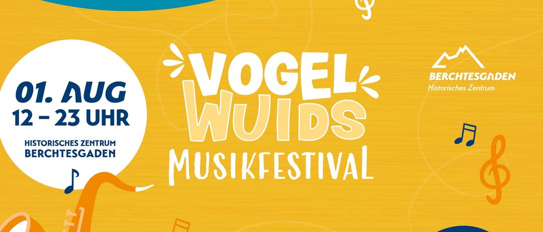 Ein leuchtend gelbes Plakat, das das Vogel Wuids Musikfestival bewirbt, mit musikalischen Noten, einer Gitarre und einem Klavier.