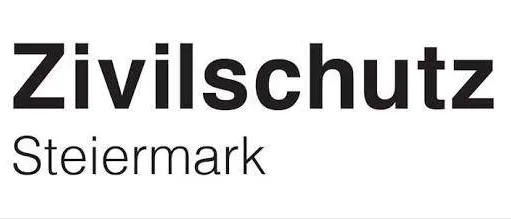 Das Logo von Zivilschutz Steiermark zeigt ein blaues Dreieck auf einem orangefarbenen quadratischen Hintergrund mit dem Text Zivilschutz Steiermark in Schwarz.