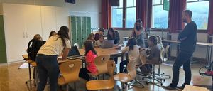 Adult, Female, Person, Woman, Furniture, Indoors, Table, People, Desk, Chair