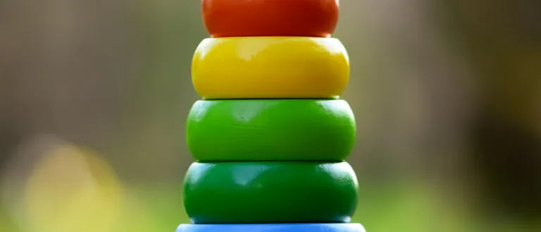 https://pixabay.com/photos/toy-tower-pyramid-wood-stack-4974392/