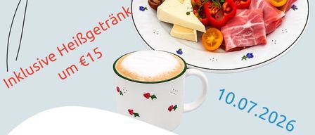 A cup with coffee foam sits next to a plate with assorted meats, cheese, and tomatoes. Text reads 'HeiBgetrank um €15' and '10.07.'