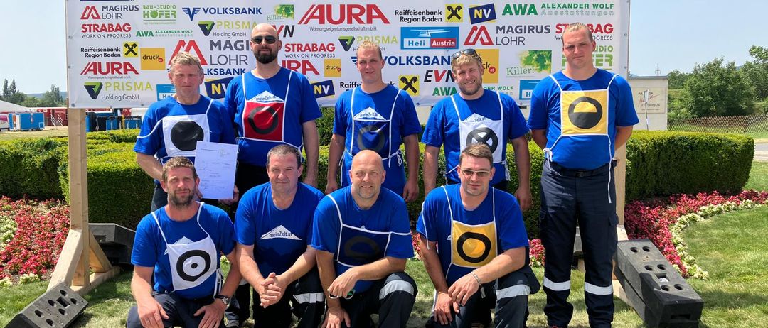 People, Person, Groupshot, Adult, Male, Man, T-Shirt, Helmet, Grass, Team