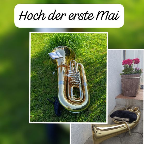 Ein Bild zeigt eine Messingtuba auf dem Rasen mit dem Text 'Hoch der erste Mai' darüber. Rechts ist ein Blumentopf mit roten Blumen zu sehen.