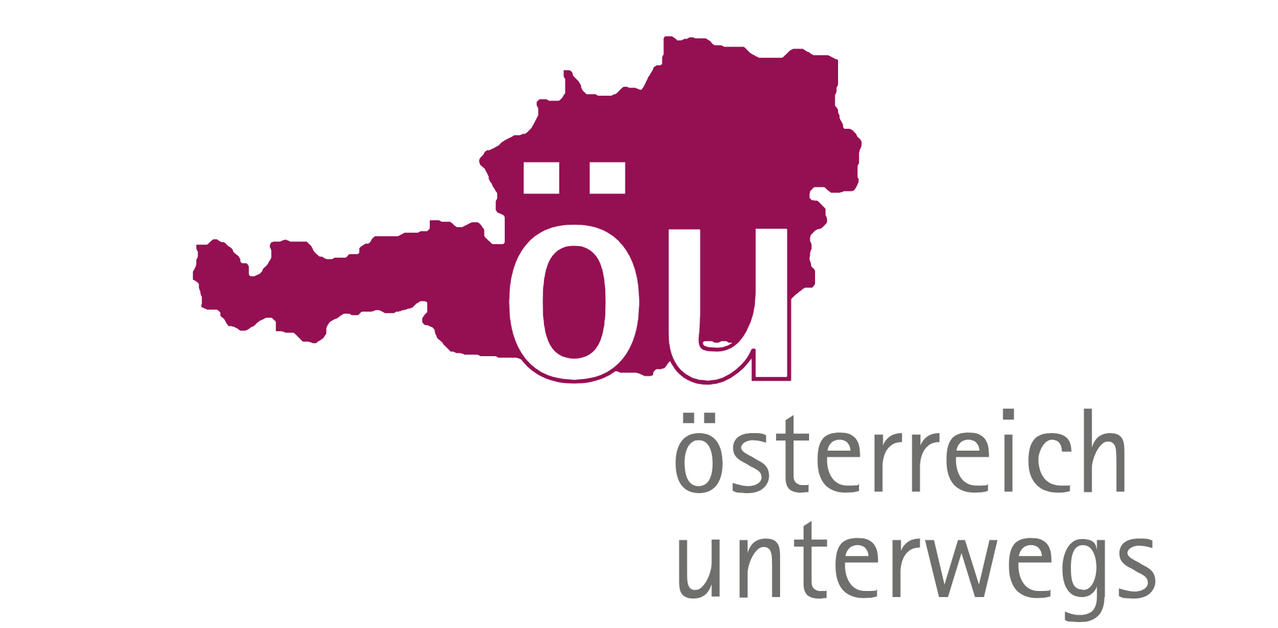 Das Logo von Osterreich Unterwegs zeigt eine kastanienbraune Umrisse von Österreich mit dem Text OU in der Mitte. Darunter steht der Text 'osterreich' in Grau.