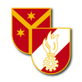 Ein Schild mit rotem Hintergrund und gelbem Rand. Es zeigt eine Flamme und ein Sternsymbol, wobei die Flamme in der Mitte platziert ist.