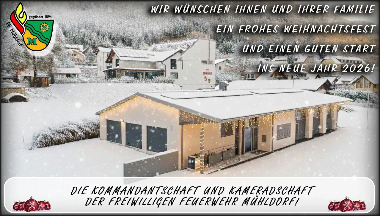 Eine winterliche Szene zeigt eine Feuerwehrstation mit Schnee auf dem Dach, umgeben von Häusern und Bergen. Die Station hat ein Schild mit 'TI' und 'ELAWARE'. Die Botschaft lautet 'WIR WÜNSCHEN IHNEN EIN FROHES WE'.