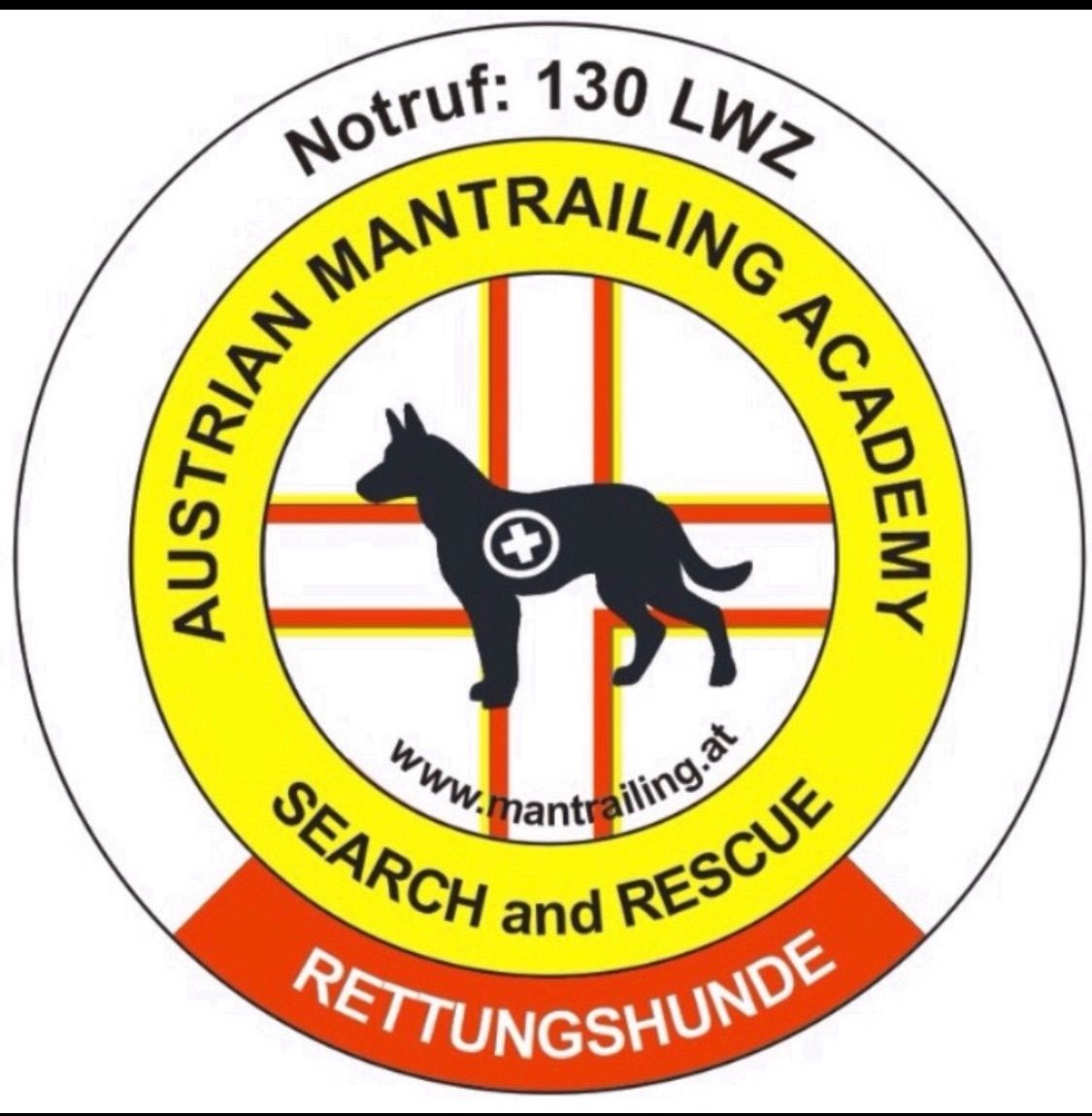 Das Logo der Austrian Mantrailing Academy zeigt einen schwarzen Hund mit einem weißen Kreuz auf der Brust, umgeben von roten, weißen und gelben Linien. Der Text lautet 'Suche und Rettung'.