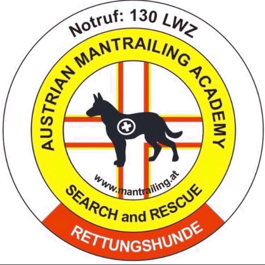 Logo for the Austrian Mantrailing Academy, featuring a black dog with a cross symbol on its back, surrounded by a yellow circle with text and a red cross in the center.