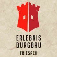 Das rote Logo von 'Erlebnis Burgbau Friesach' mit einem Burgturm mit drei Fenstern auf beigem Hintergrund.