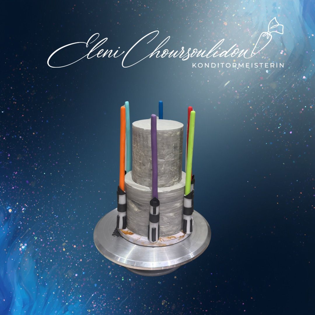 A cake resembling a Star Wars lightsaber, with multiple colors, on a blue starry background. The cake has three tiers.