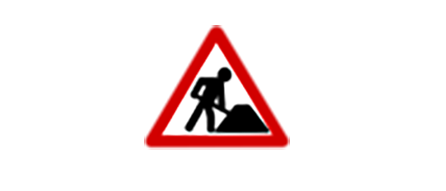 Ein rotes Warnschild mit einer Person, die in einem Dreieck gräbt.