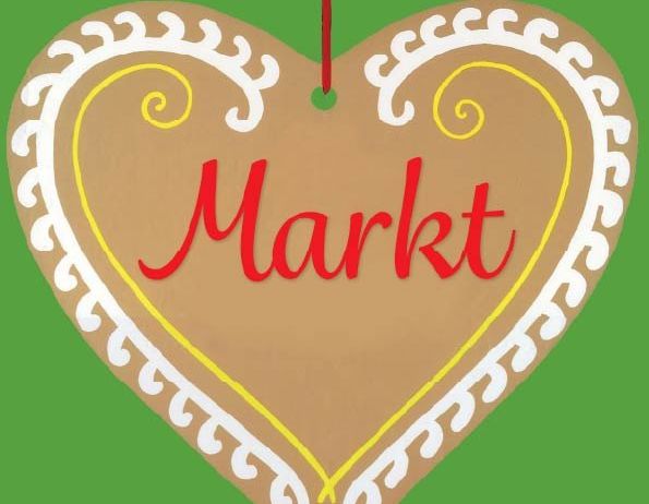 Ein herzförmiger Lebkuchen mit dem Wort 'Markt' in Rot auf grünem Hintergrund, gebunden mit einem roten Band. Der Hintergrund enthält den Text 'Der Markhandel Steiermark'.