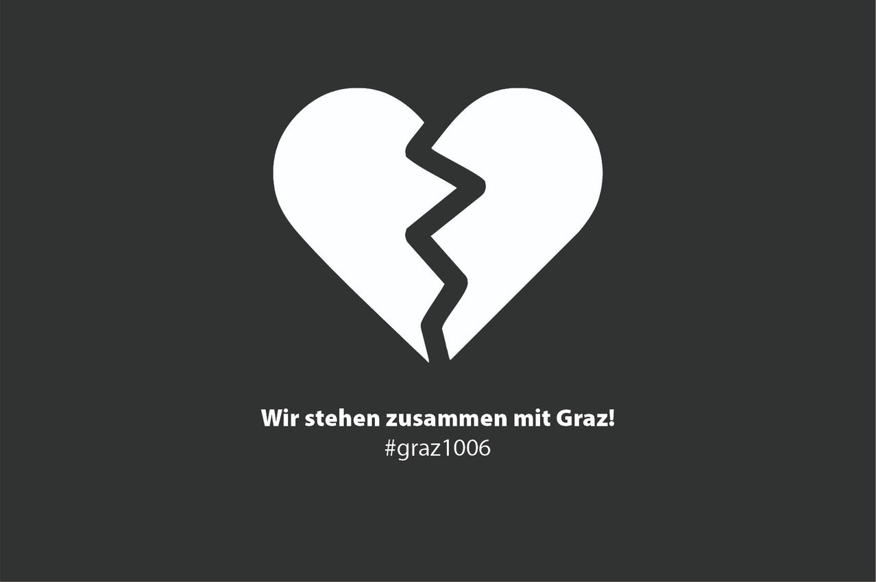 Auf einem schwarzen Hintergrund befindet sich ein zerbrochenes weißes Herz mit dem Text 'Wir stehen zusammen mit Graz!' und dem Hashtag '#graz1006'.