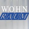 Das blau-weiße Logo für Wohn Raum ist auf weißem Hintergrund dargestellt. Der Text ist fett und zentriert.