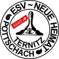 Ein rundes Logo für einen Schachverein. Es zeigt einen Schachspringer, die Worte 'ESV' darüber und 'Neue Heimat' darunter. Das Wort 'Ask' steht auf einem roten Aufkleber auf der linken Seite.