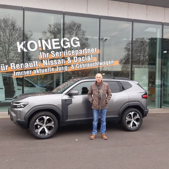 Bild enthält, Coat, Car, Suv, Adult, Male, Man, Person, Wheel, Jeans, Car Dealership