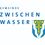 Infrastruktur Zwischenwasser - Bauhof und Gebäudeinstandhaltung -Logo. Bild enthält, Logo, Glass, Text, Smoke Pipe