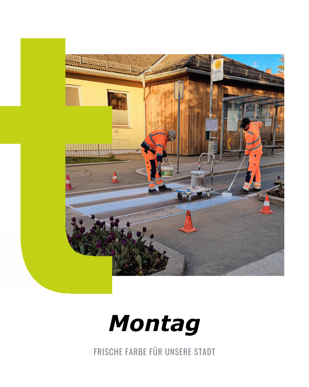 Two workers are painting the crosswalk in front of a building. There are orange traffic cones around the area.