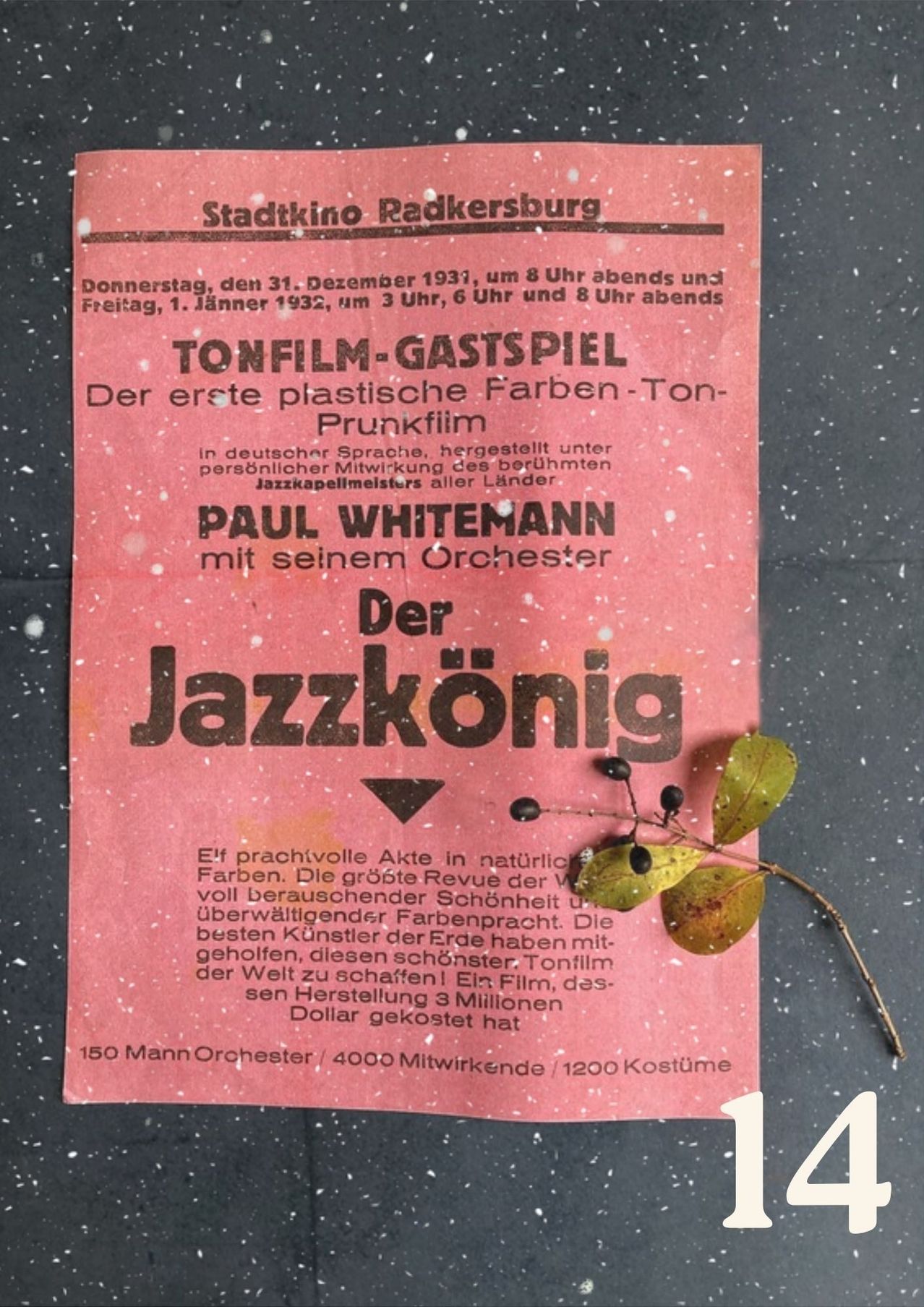 Ein roter Werbeplakat für eine Filmvorführung im Stadtkino Radkersbrug. Die Veranstaltung zeigt einen Farbtonfilm, präsentiert von Paul Whitemann und seinem Orchester. Das Plakat enthält Datum und Uhrzeiten für die Vorführungen.