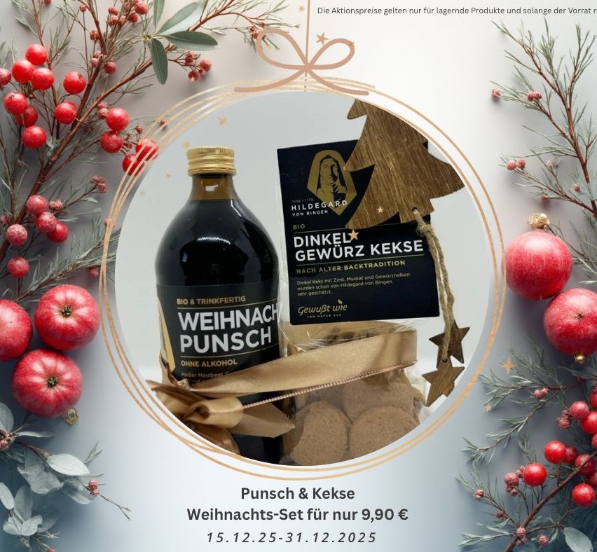 Eine Flasche Weihnachtspunsch und eine Schachtel Lebkuchen in einem Kreis, umgeben von Weihnachtsdekoration. Der Preis für das Set beträgt 9,90 Euro. Das Angebot gilt vom 15. Dezember bis 31. Dezember 2025.