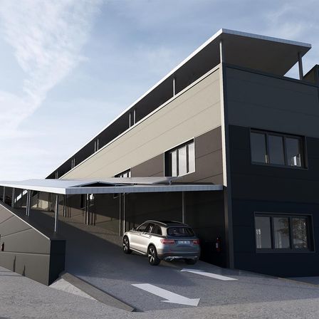 Eine architektonische Darstellung eines modernen Gebäudes mit einem unter einem Vordach geparkten Auto. Das Gebäude hat ein flaches Dach, mehrere Fenster und eine graue Außenfassade.