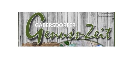 A wooden sign displays 'Gabersdorfer Genuss-Zeit'. The background is a wooden texture.