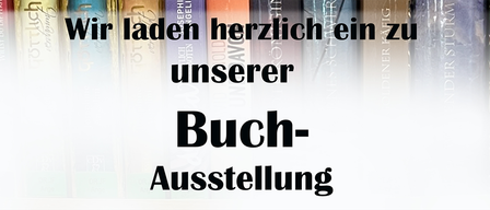 An image of several books with a black text overlay reading 'herzlich willkommen in unserer Buch-Ausstellung' (welcome to our book exhibition) in German.
