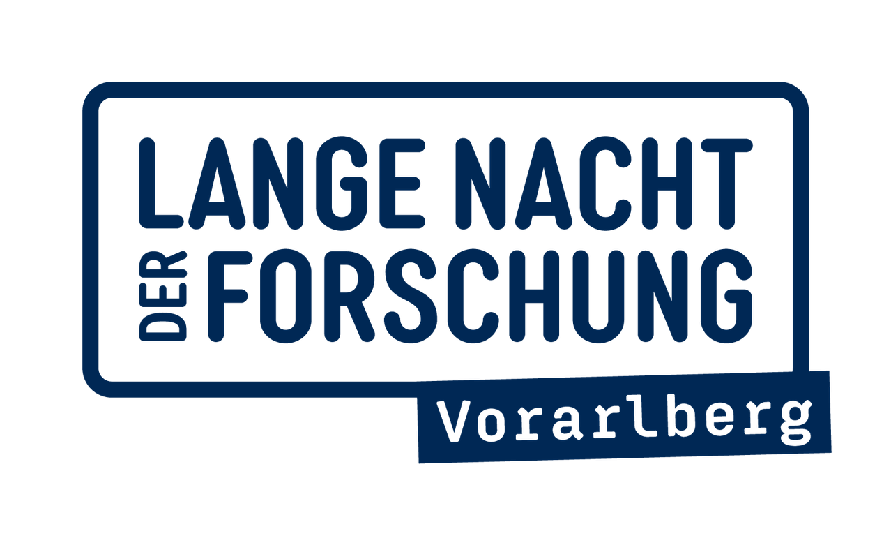 A sign with blue text on a black background reads Lange Nacht der Forschung. Below it is the word Vorarlberg in white.