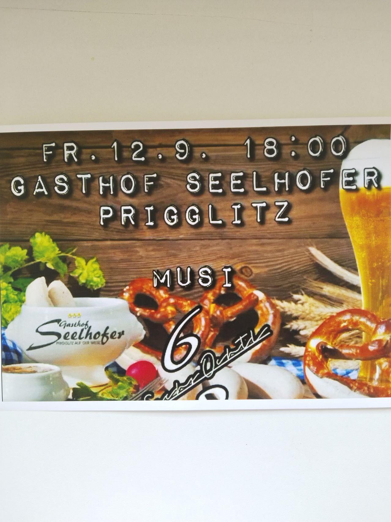 Plakat für Gasthof Seelhofer in Prigglitz, zeigt ein Bierglas, Brezen und andere Speisen. Die Veranstaltung ist am Freitag, 12. September um 18:00 Uhr.