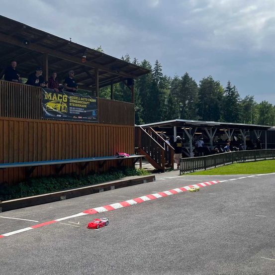 Image contains, Road, Person, Helmet, Outdoors, Shoe, Car, Vehicle, Head, Hat