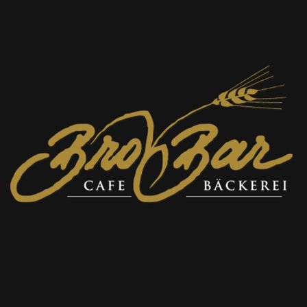 Das Logo für ein Cafe-Backerei ist auf schwarzem Hintergrund dargestellt, mit einer stilisierten Weizenähre über dem Text 'Brok Bar Cafe Backerei'.