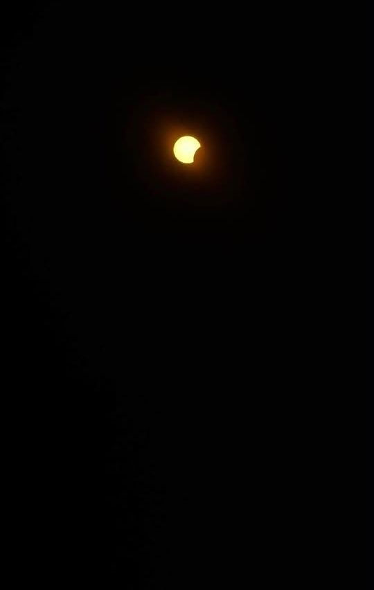 A crescent moon is visible in the night sky, glowing softly against the dark backdrop.