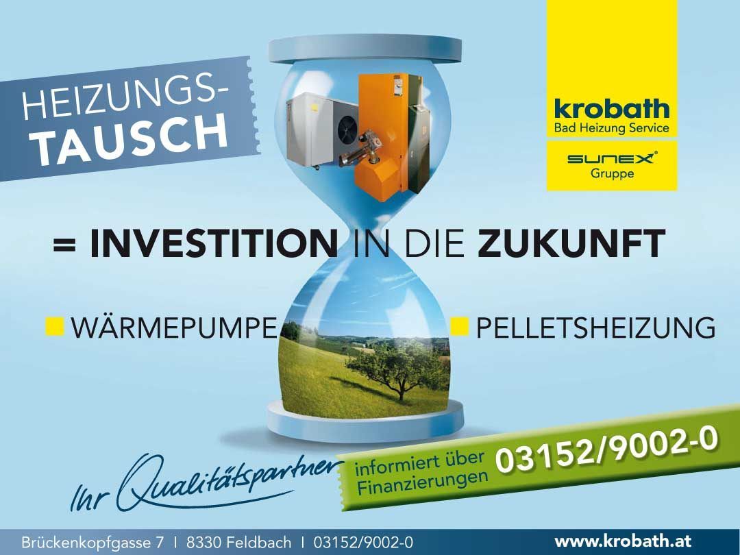An advertisement for Krobat Bad Heizung Seri, featuring an hourglass with a heat pump inside, symbolizing investment in the future. The image includes a landscape and a contact number.