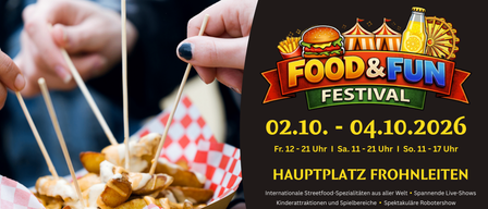 A hand holding a stick with food in a basket, a food festival advertisement in the background.